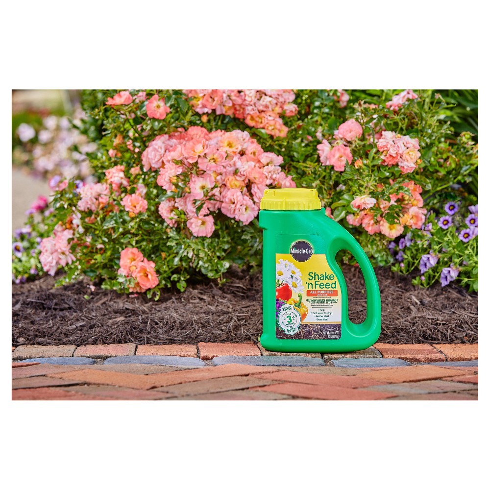 slide 2 of 5, Miracle-Gro Shake 'N Feed All Purpose Continuous Release Plant Food 4.5lb, 4.5 lb