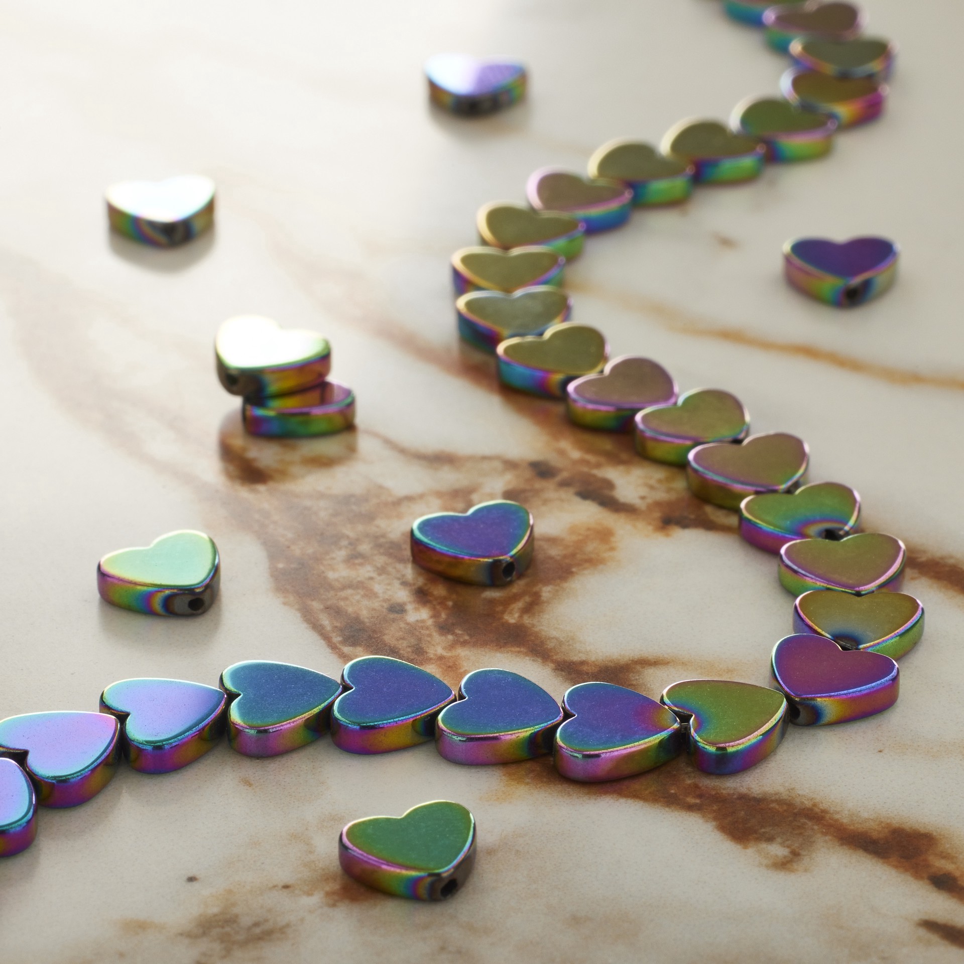 slide 3 of 3, Rainbow Reconstituted Hematite Heart Beads, 8mm By Bead Landing, 8mm