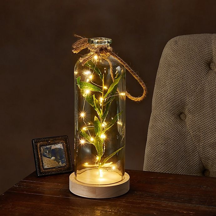 slide 3 of 3, Elements LED Glass Bottle with Faux Greenery, 13 in