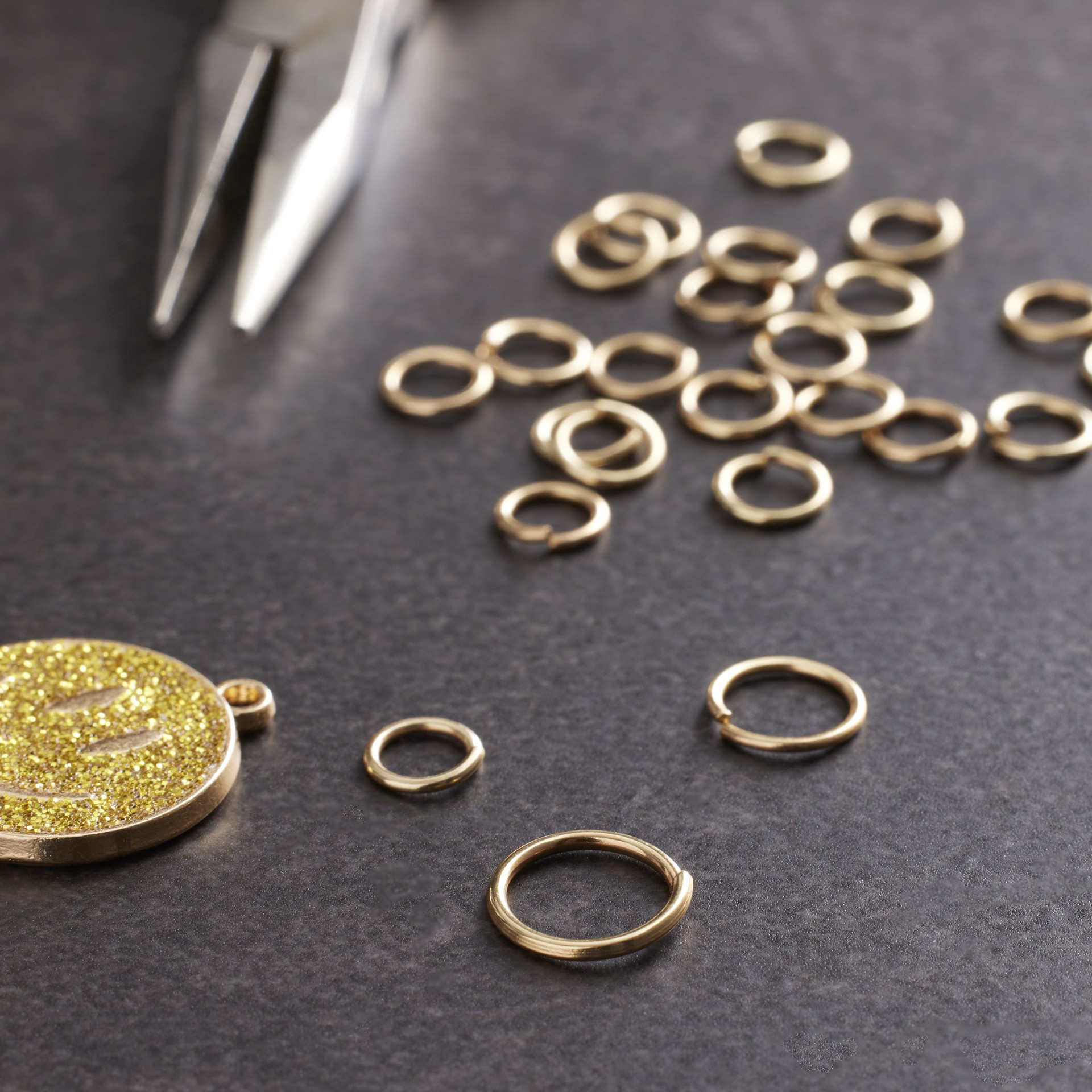 slide 2 of 3, Gold Jump Rings By Creatology, 6 mm, 8 mm, and 10 mm jump ring sizes