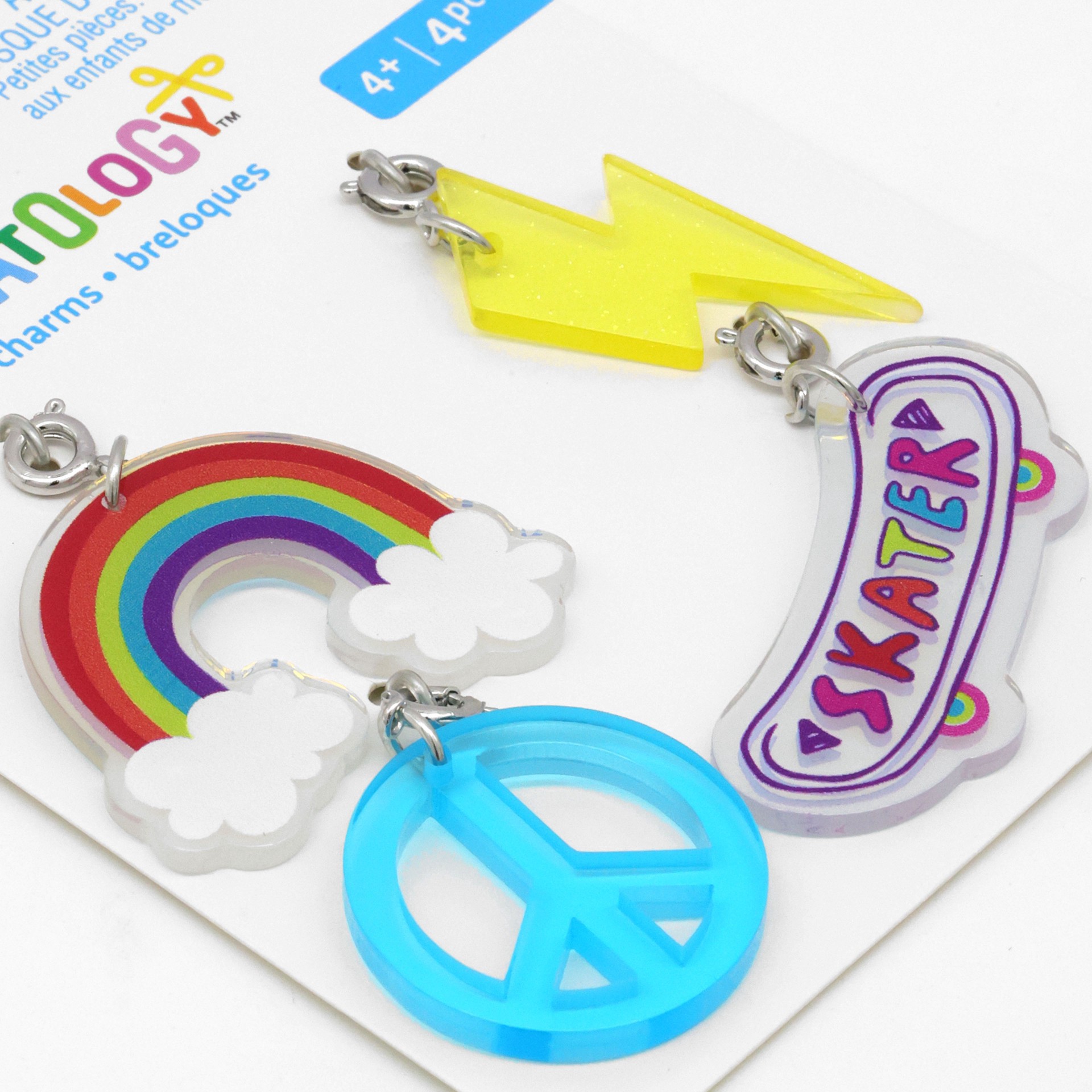 slide 2 of 3, Rainbow, Bolt, Peace Sign & Skateboard Charms By Creatology, 0.98 in