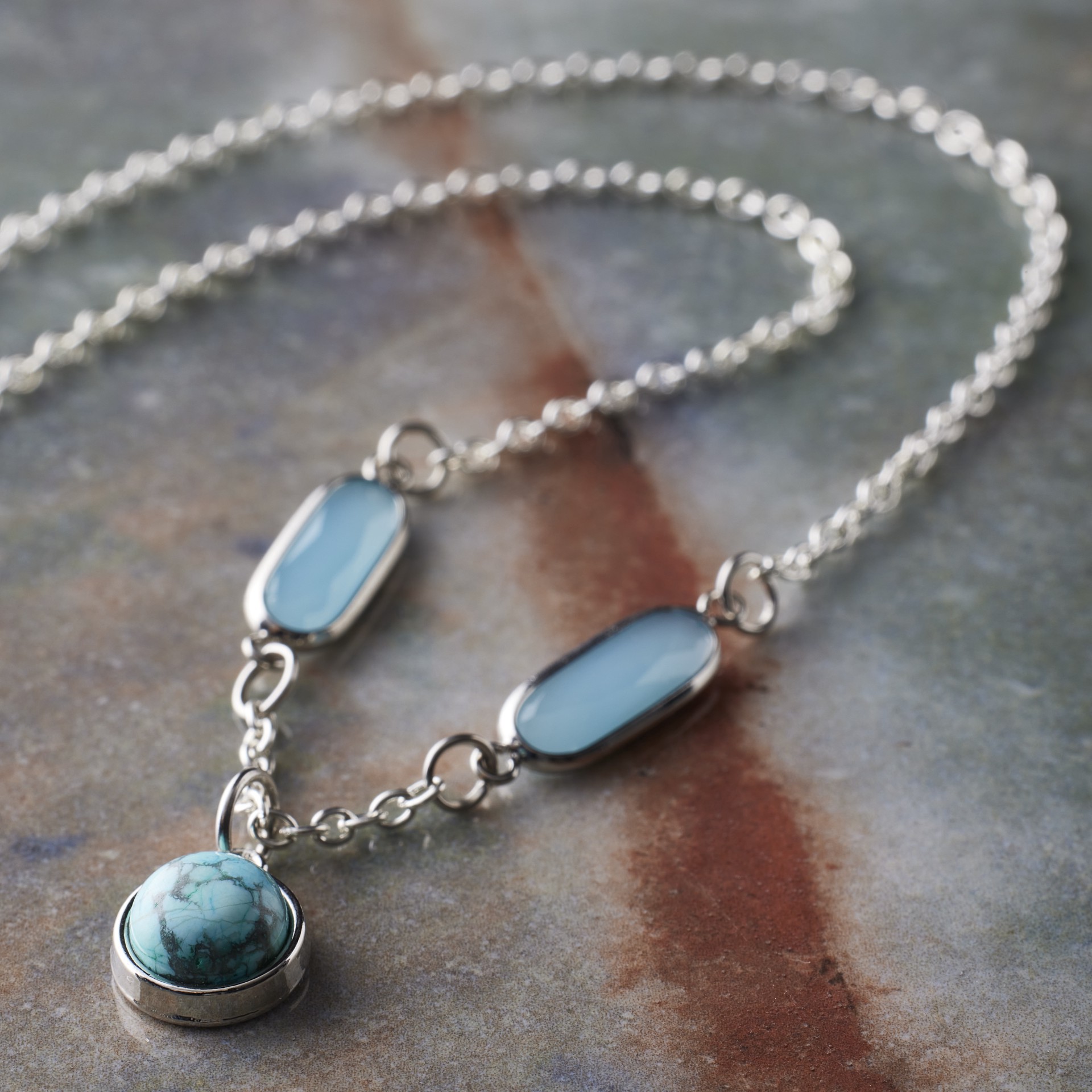 slide 3 of 3, Round Turquoise Dyed Howlite Charm By Bead Landing, 10 mm charm diameter