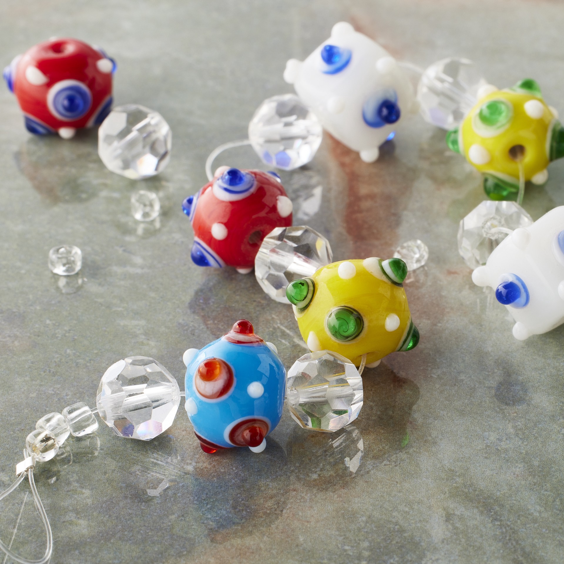 slide 3 of 3, Multicolor & Clear Lamp Work Glass Mixed Beads By Bead Landing, 7 in