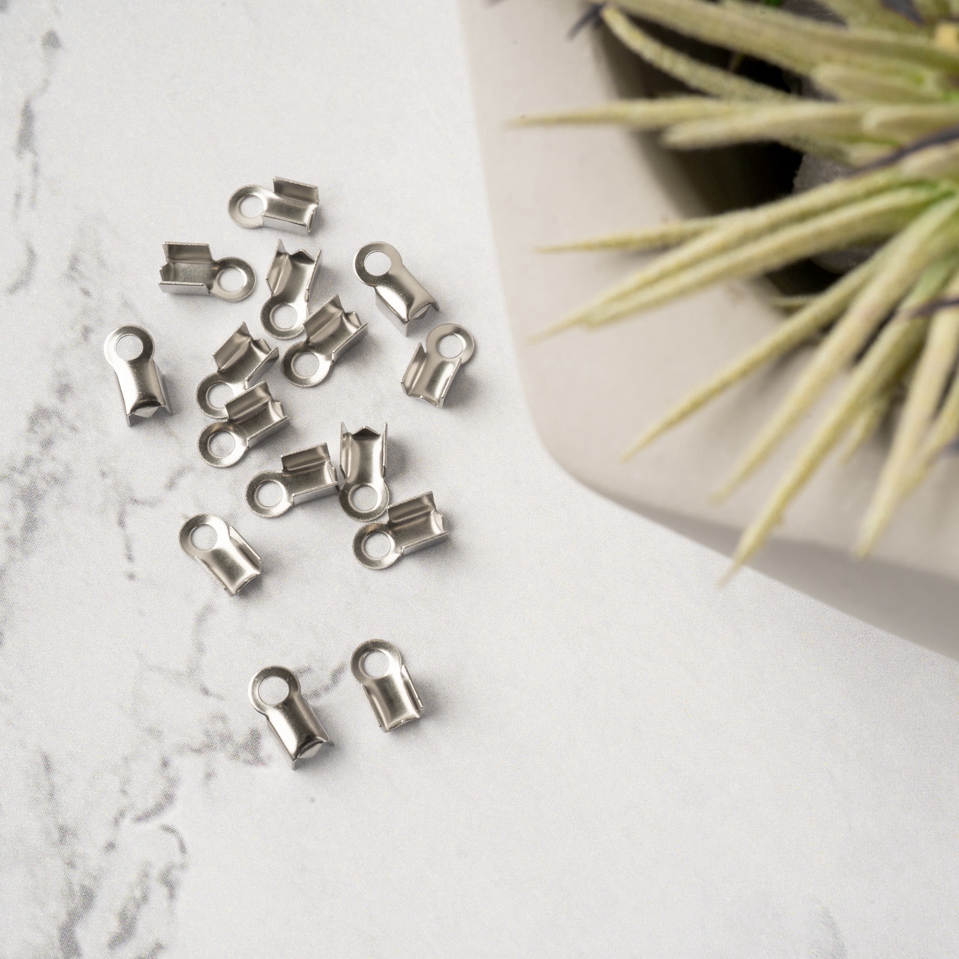 slide 2 of 3, 9mm Stainless Steel Folding End Crimps By Bead Landing, 9 mm