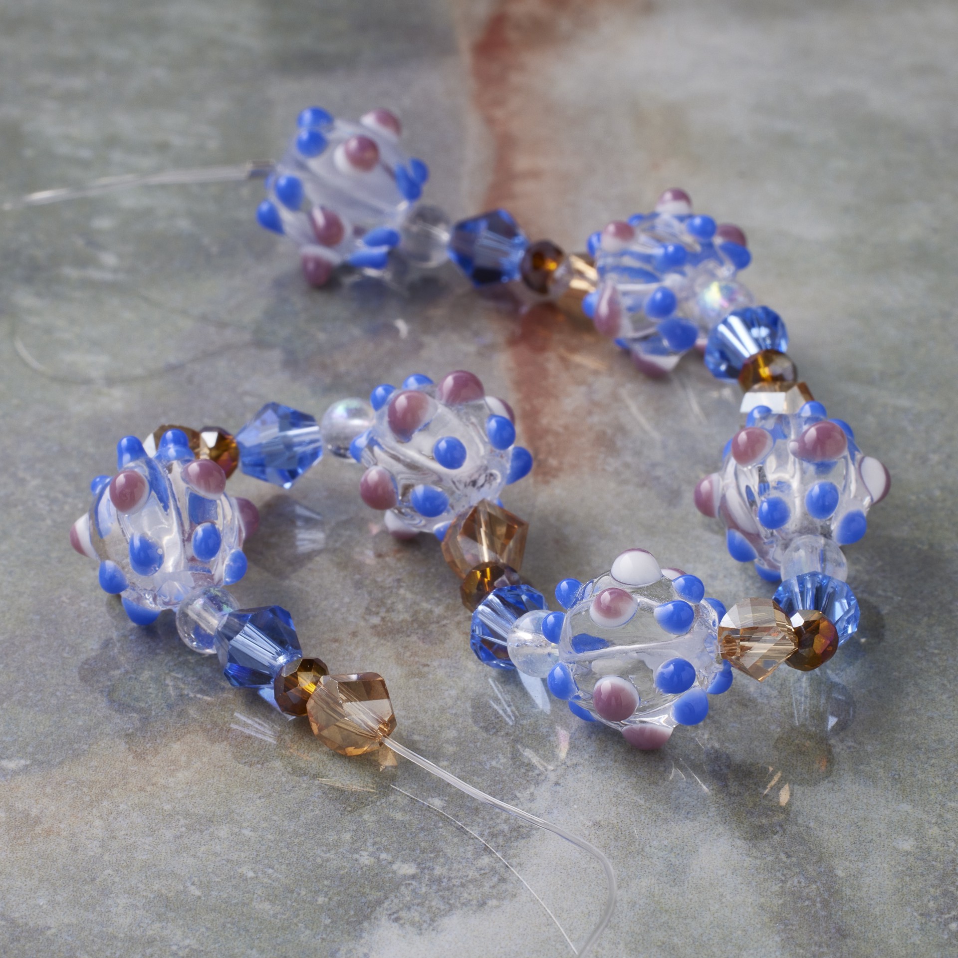 slide 2 of 3, Blue Lampwork Glass Bumpy Round Beads By Bead Landing, 10mm-13mm