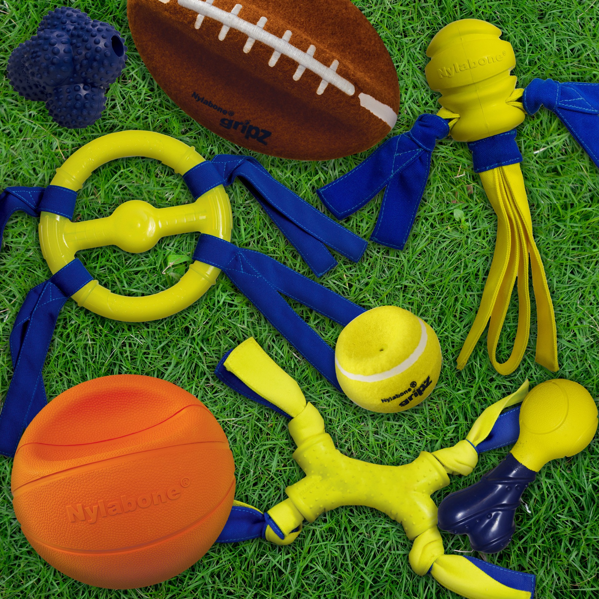slide 3 of 10, Nylabone Power Play Dog Football Gripz Medium/Wolf - Up to 35 lbs. 5.5 Inch (1 Count), 1 ct