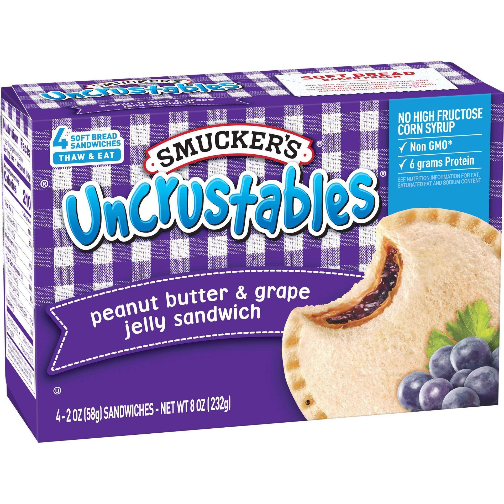 slide 1 of 4, Smucker's Uncrustables Peanut Butter & Grape Jelly Sandwich, 4 ct; 8 oz