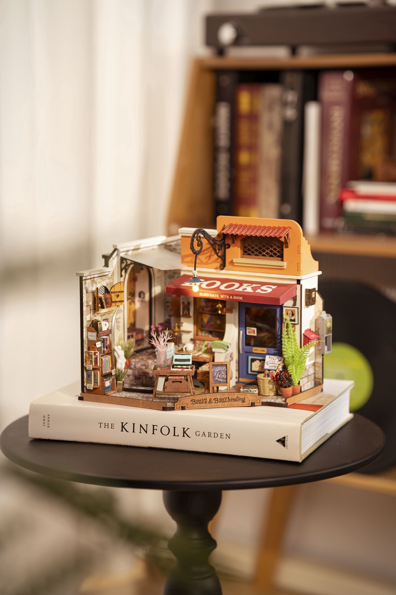 slide 5 of 9, Robotime Rolife Corner Bookstore Diy Miniature House Kit, 7 in x 6.5 in x 10 in