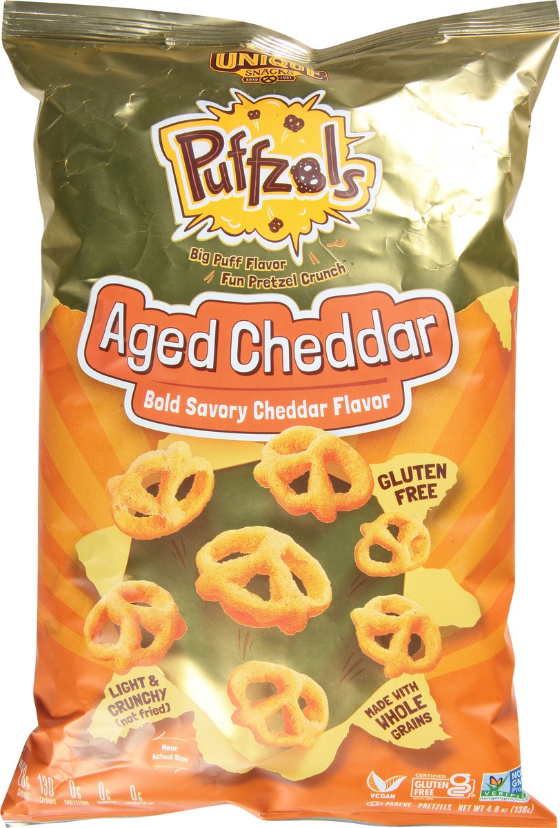 slide 5 of 9, Unique Snacks Puffzols Aged Cheddar Pretzels 4.8 oz, 4.8 oz