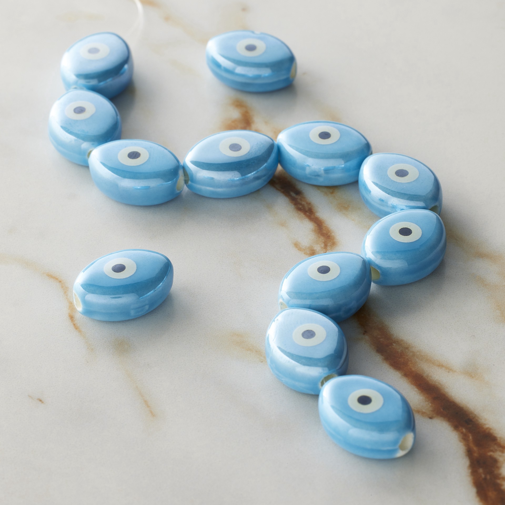 slide 2 of 3, Blue Ceramic Evil Eye Beads, 15.5mm By Bead Landing, 15.5mm