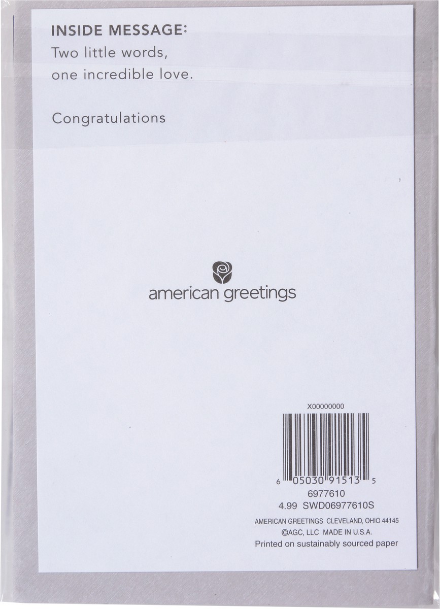 slide 8 of 9, American Greetings Ring in their new lives together with this elegant wedding card. The design features two metallic gold wedding bands on a navy blue background and the words “I DO” on the front. The inside contains simple words of congratulations for the happy couple. It's suitable for sending to any twosome on their happy day. Envelope included., 1 ct
