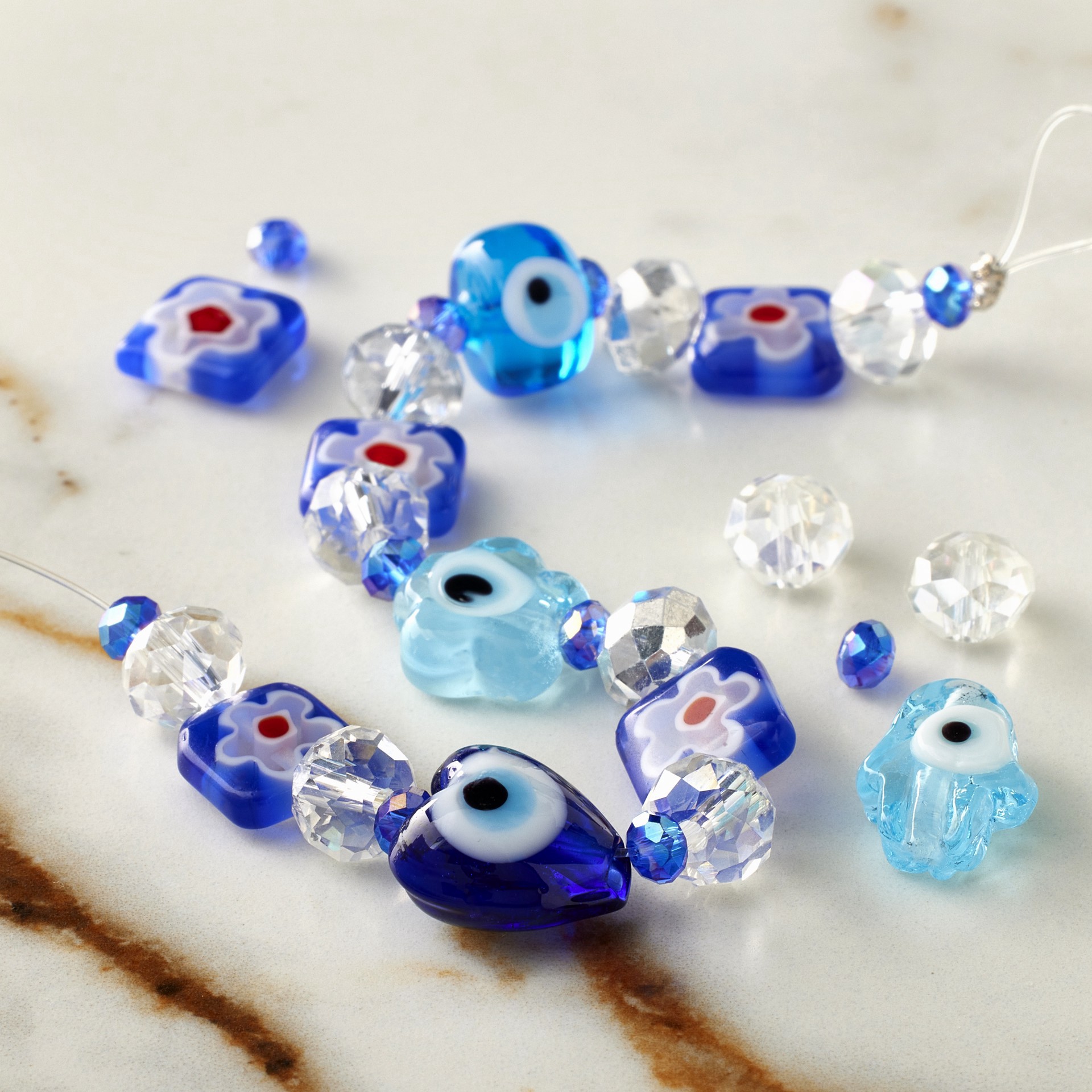 slide 2 of 3, Blue Evil Eye Lampwork Glass Bead Mix By Bead Landing, 6mm x 9mm