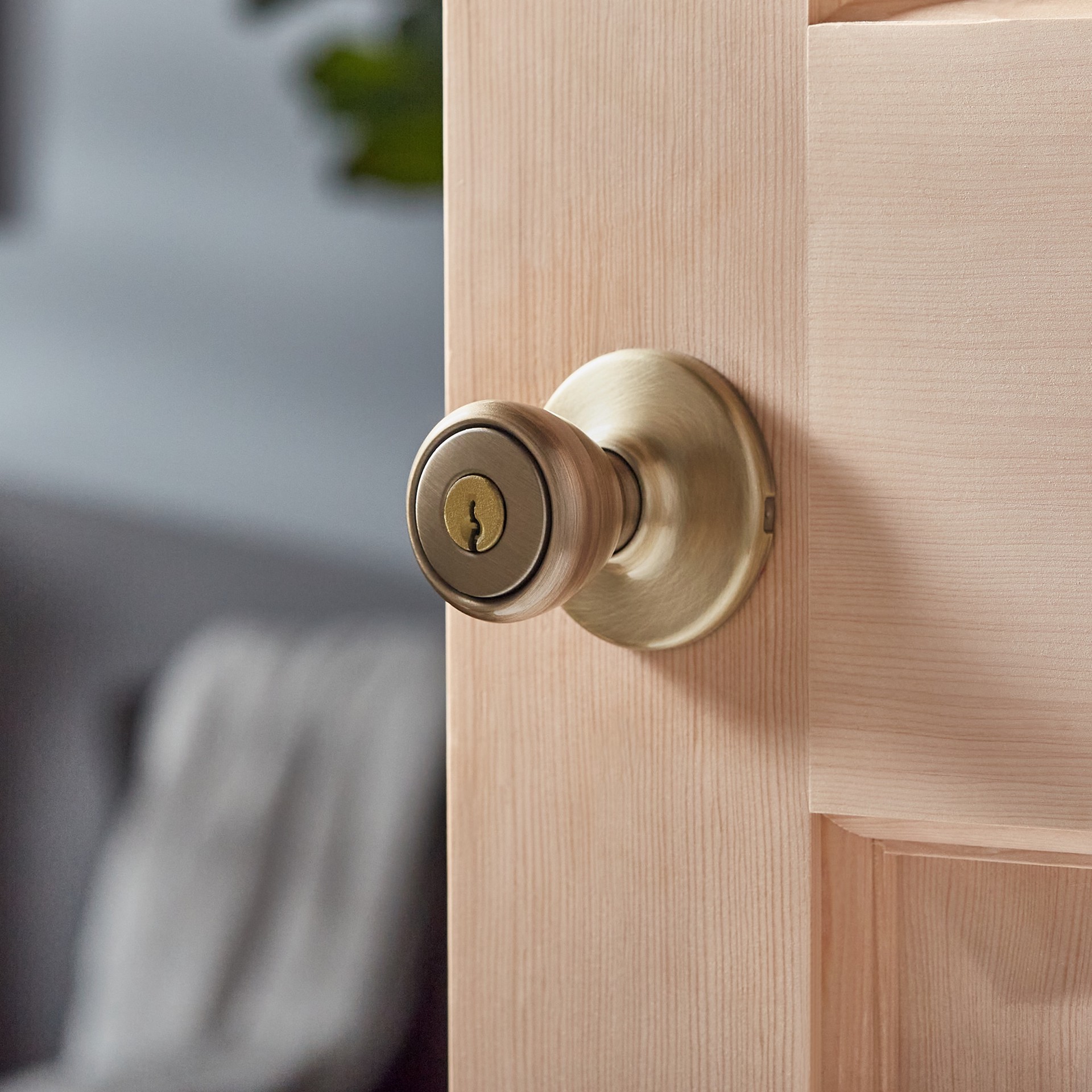 slide 2 of 6, Kwikset Tylo Antique Brass Exterior Keyed Entry Door Knob, 1 ct