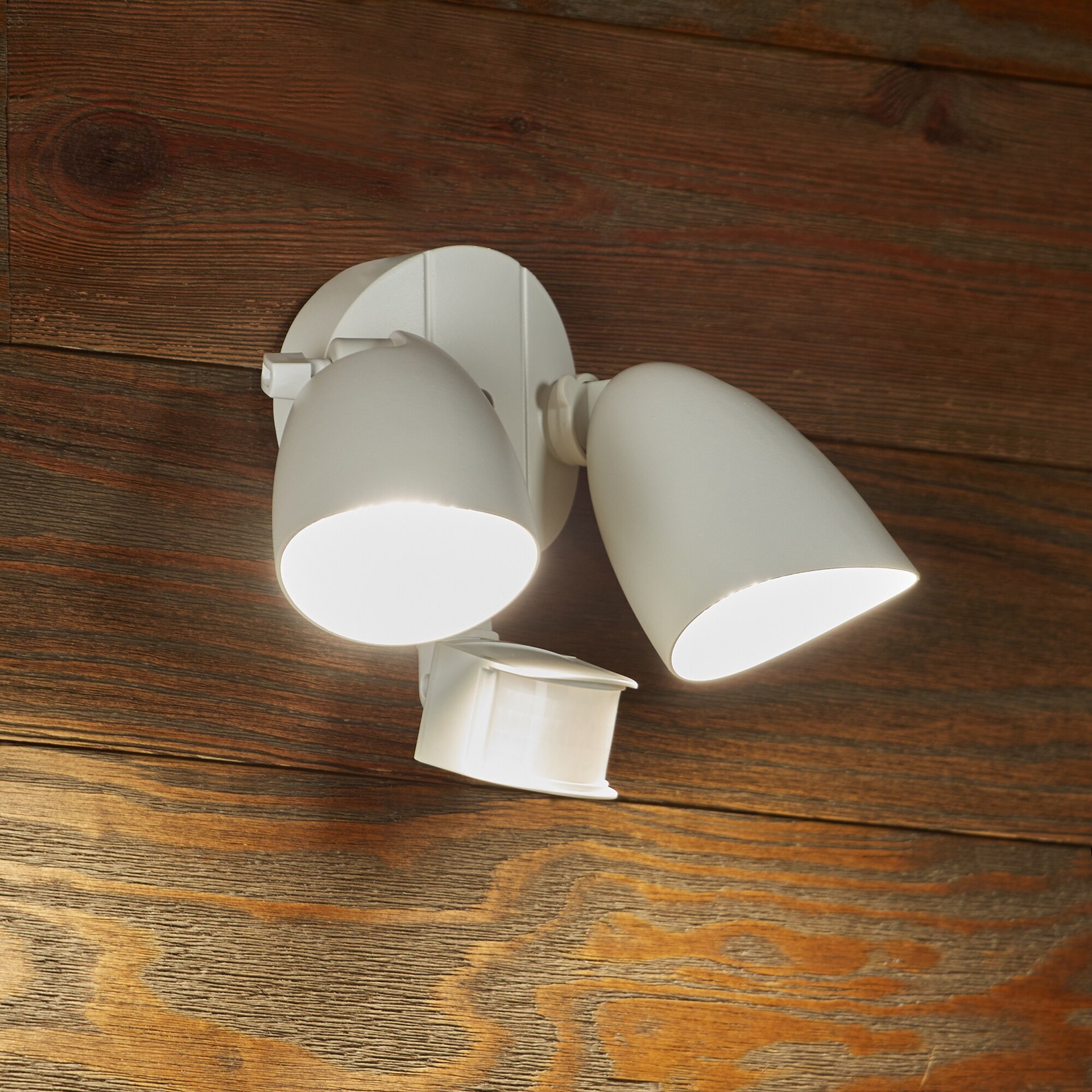 slide 3 of 6, Utilitech 110 -Degree 150 -Wattage Equivalent Hardwired LED White 2 -Head Motion-Activated Flood Light with Timer 1500 -Lumen, 1 ct