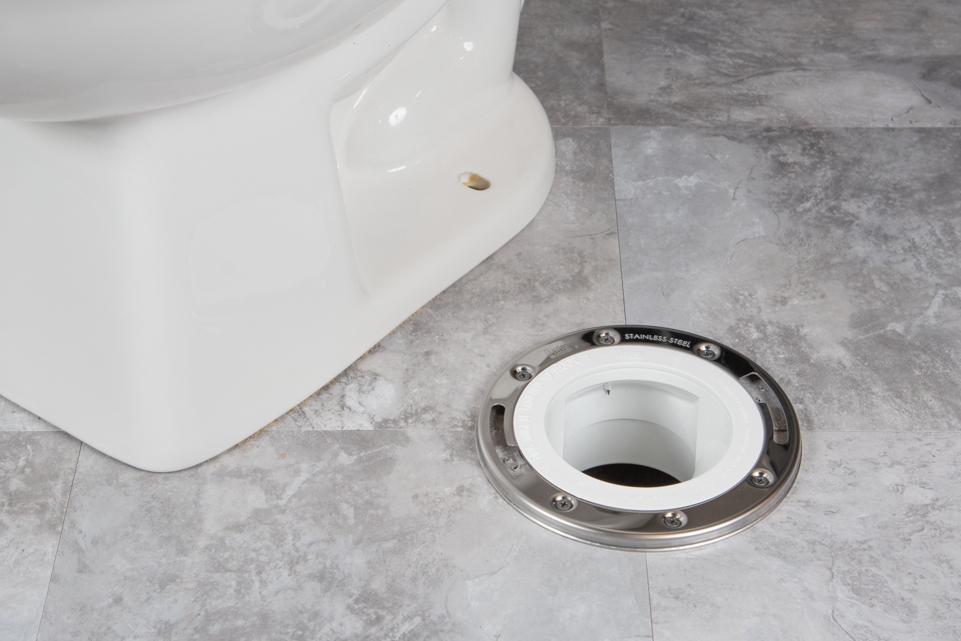 slide 3 of 6, Oatey Level Fit Offset 3.958-in White PVC Anchor flange, 1 ct