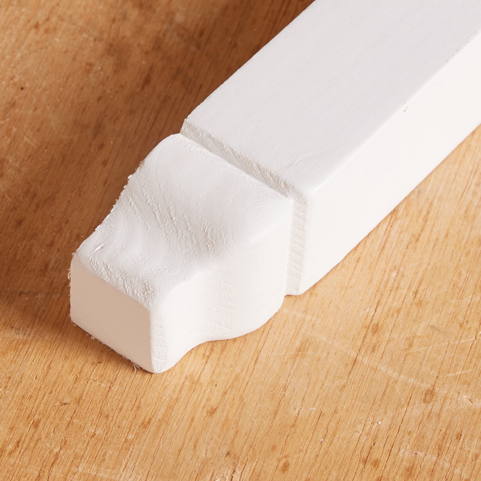 slide 2 of 6, Ornamental Mouldings 6-1/2-in x 1-1/8-in Interior Primed Colonial 1895 Inside corner Baseboard Moulding Block, 1 ct