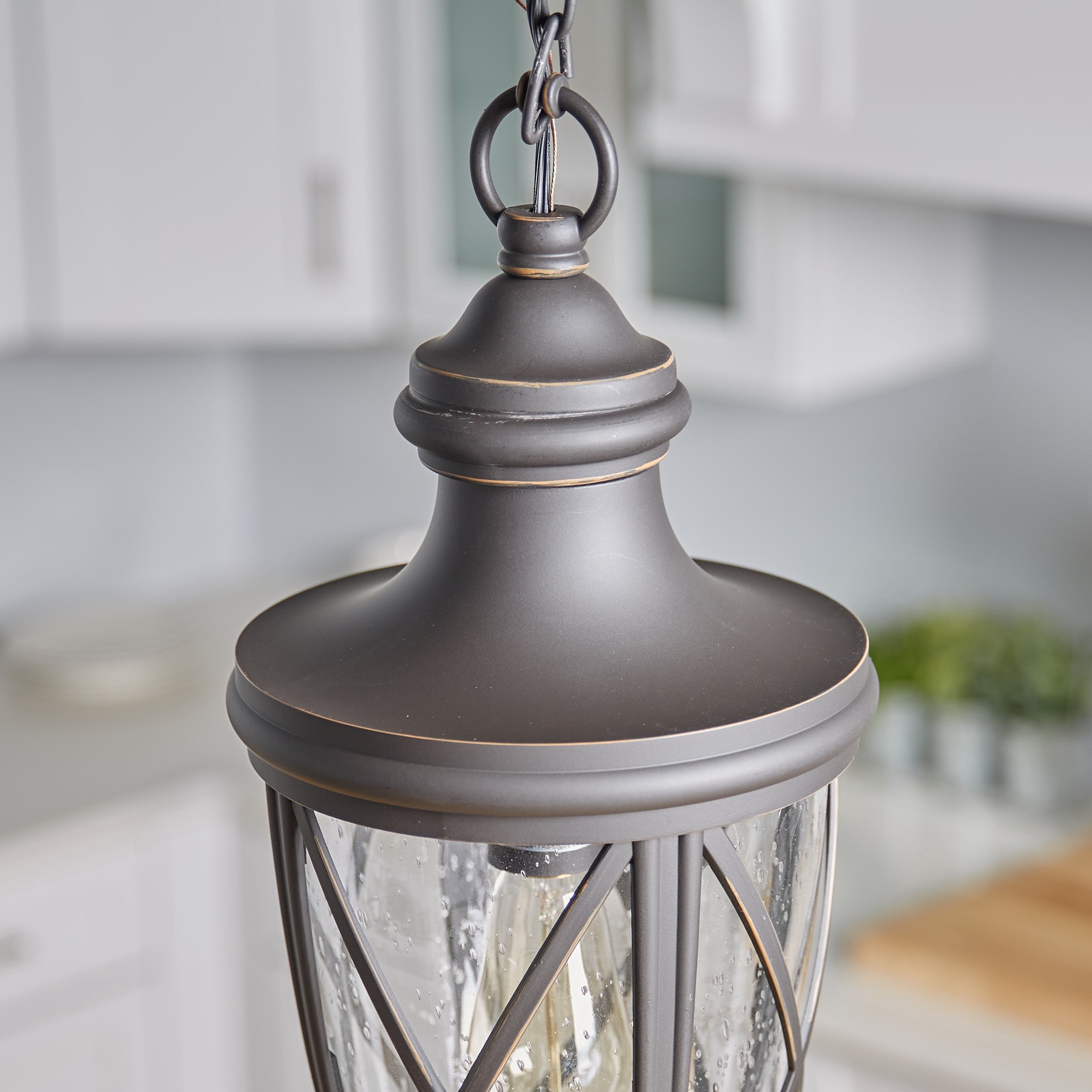 slide 3 of 6, allen + roth Castine 1 -Light Bronze Craftsman Seeded glass Lantern Medium Outdoor Hanging Pendant light, 1 ct