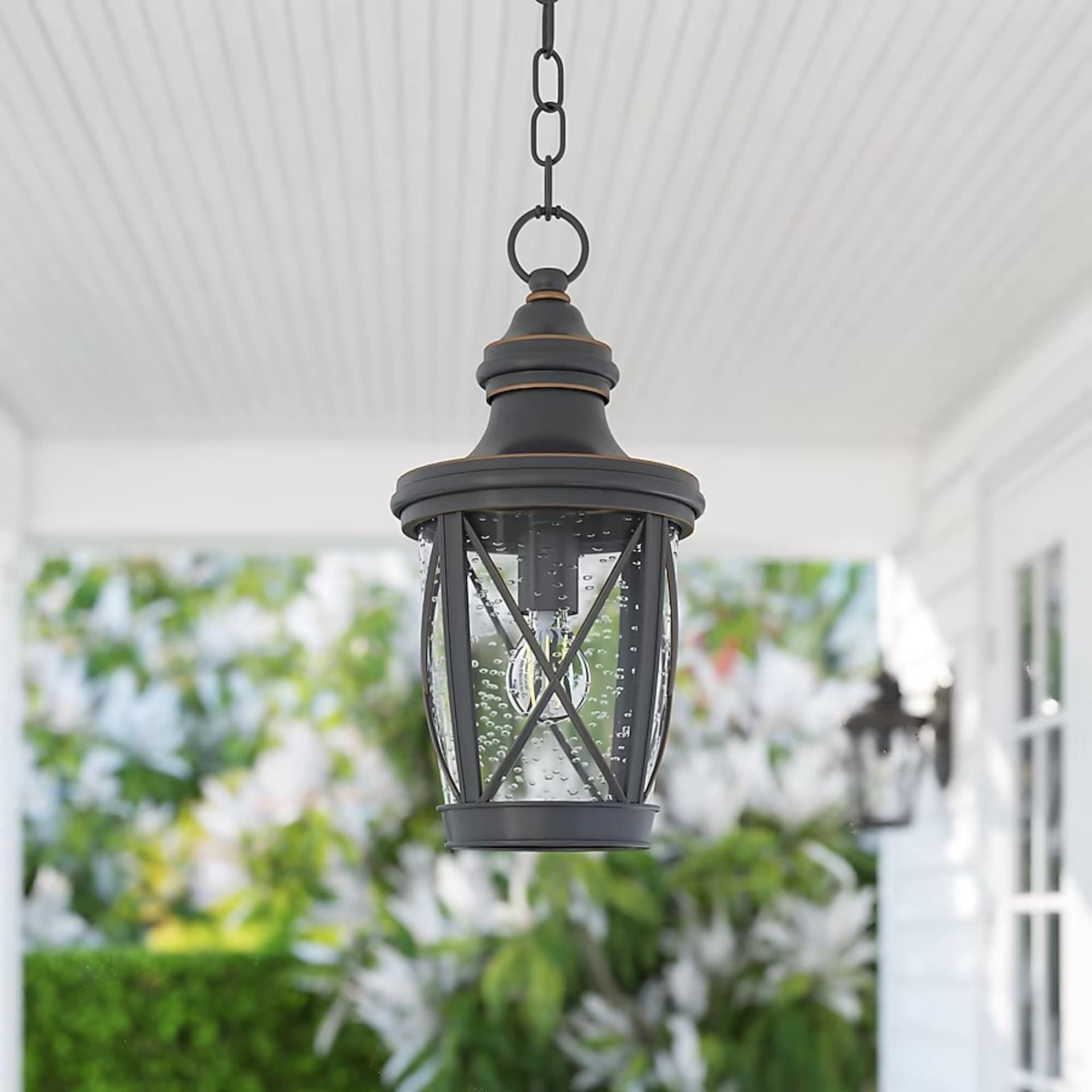 slide 1 of 6, allen + roth Castine 1 -Light Bronze Craftsman Seeded glass Lantern Medium Outdoor Hanging Pendant light, 1 ct