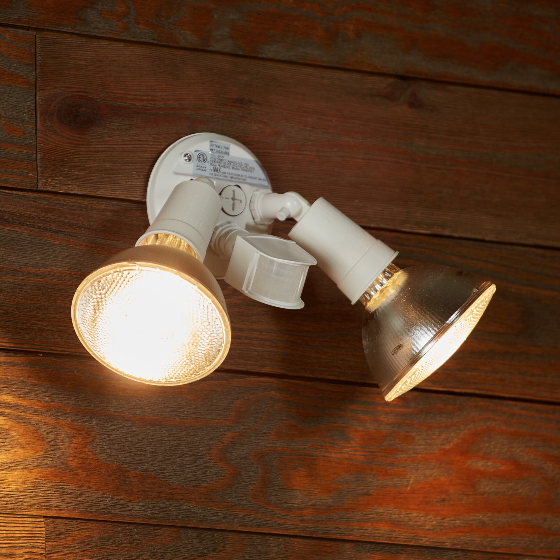 slide 3 of 6, Utilitech 110 -Degree 120 -Wattage Equivalent Hardwired Halogen white 2 -Head Motion-Activated Flood Light with Timer, 1 ct