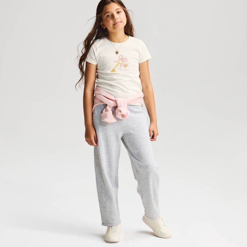 slide 1 of 3, Girls' Short Sleeve 100% Cotton 'Key' Graphic T-Shirt - Cat & Jack™ Cream L, 1 ct