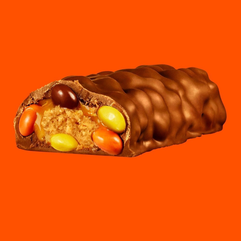 slide 4 of 4, Reese's OUTRAGEOUS! STUFFED WITH PIECES Milk Chocolate, Peanut Butter and Caramel Snack SIze Candy Bars, 9.17 oz, Bag, 9.17 oz