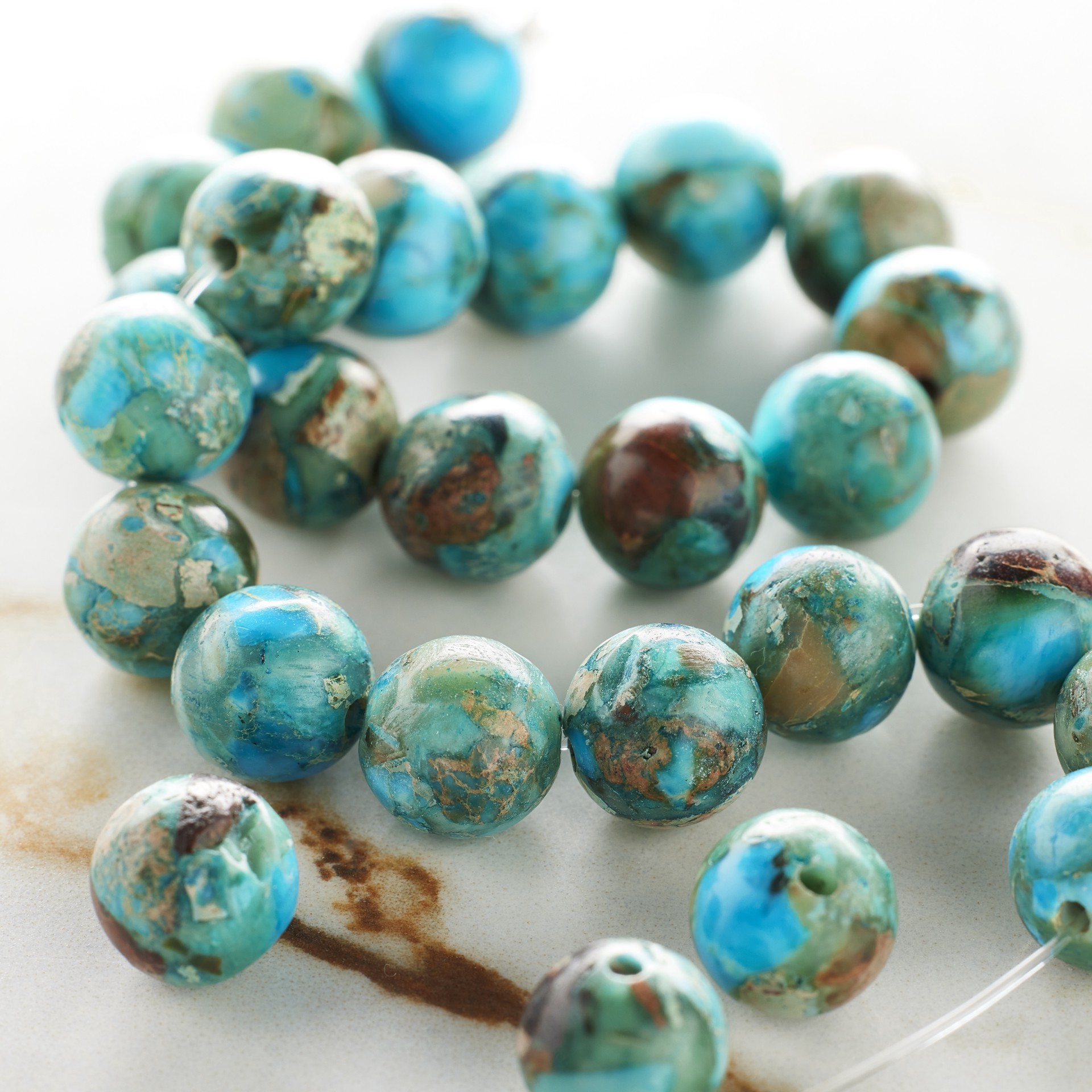slide 3 of 3, Dyed Turquoise Imperial Jasper Round Beads, 8mm By Bead Landing, 8mm