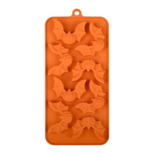 slide 1 of 4, Jack-O'-Lantern Bat Silicone Candy Mold By Makery, 4.07 in x 8.87 in