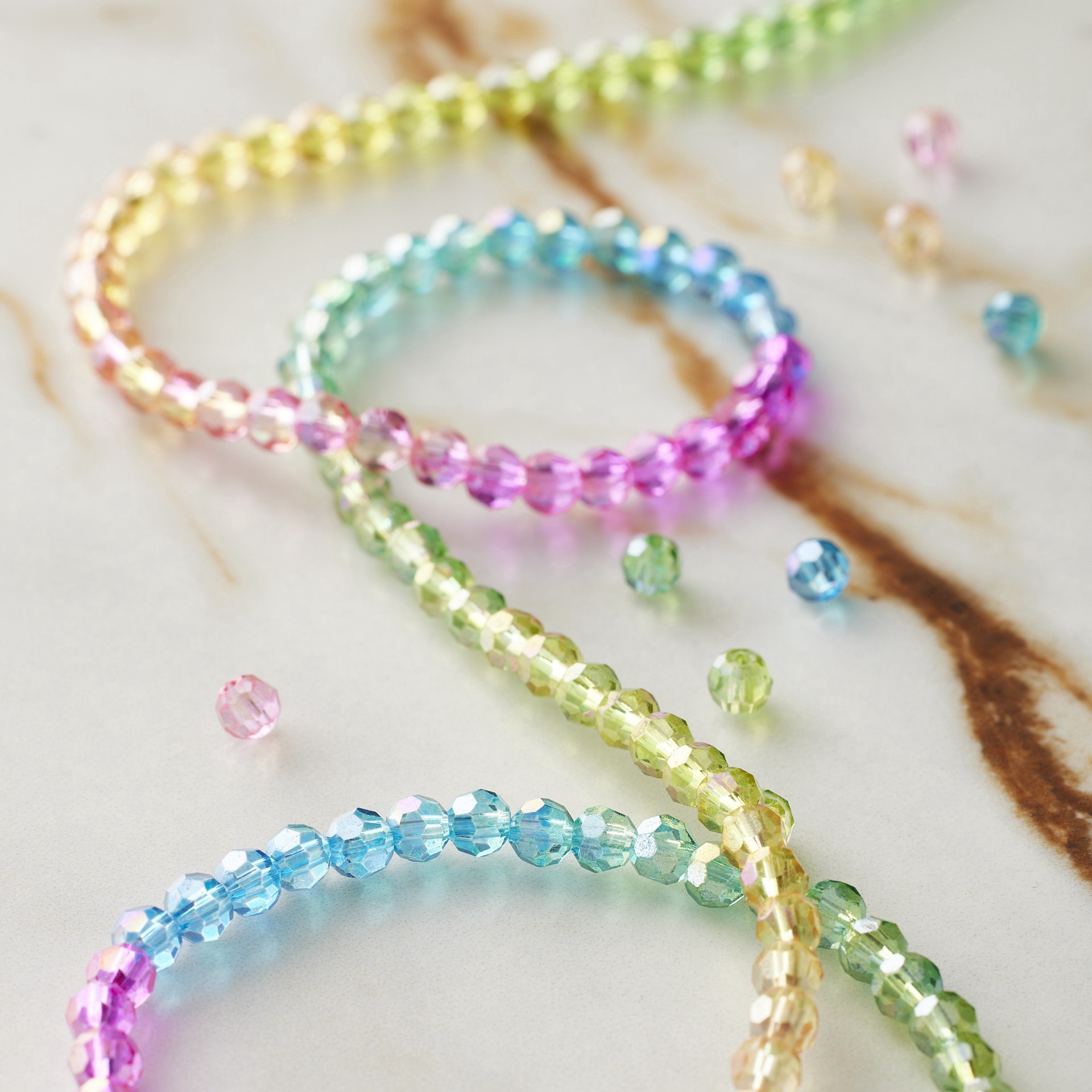 slide 2 of 3, Rainbow Glass Faceted Round Beads, 3.5mm By Bead Landing, 3.5mm