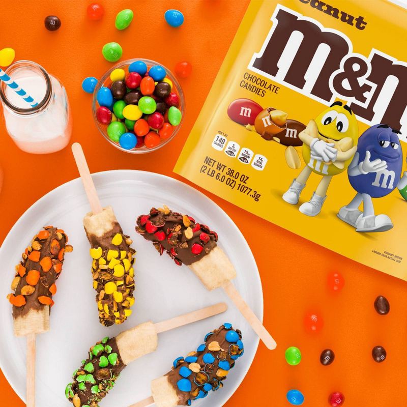 slide 6 of 8, M&M's Party Size Peanut Chocolate Candy - 38oz, 38 oz