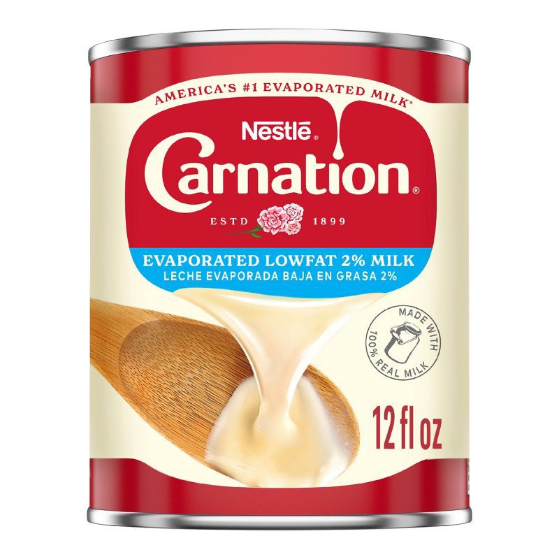 slide 1 of 7, Nestle Carnation Low Fat 2% Evaporated Milk for Pumpkin Pie and Cooking - 12 fl oz, 12 fl oz