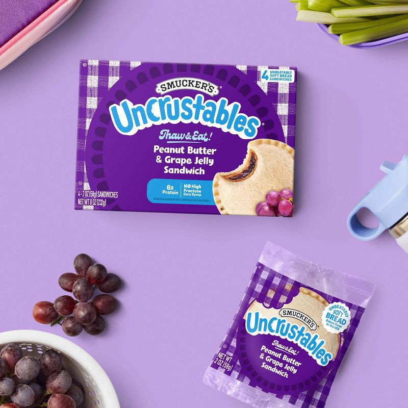 slide 7 of 10, Smucker's Uncrustables Frozen Peanut Butter & Grape Jelly Sandwich - 8oz/4ct, 4 ct; 8 oz