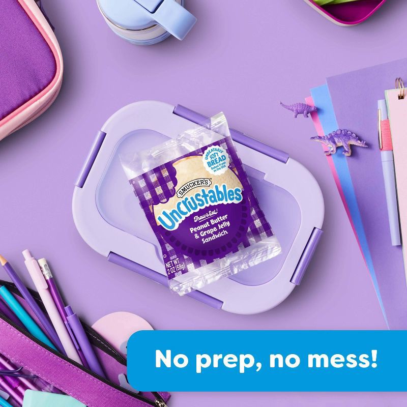 slide 6 of 10, Smucker's Uncrustables Frozen Peanut Butter & Grape Jelly Sandwich - 8oz/4ct, 4 ct; 8 oz