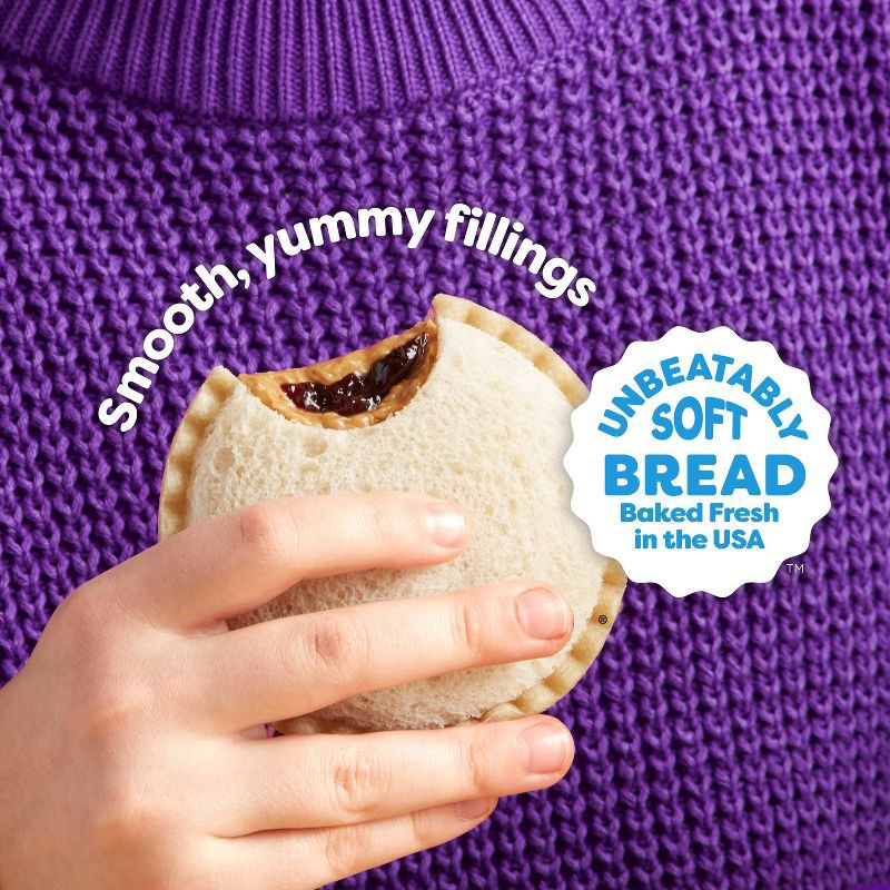 slide 4 of 9, Smucker's Uncrustables Frozen Whole Wheat Peanut Butter & Grape Jelly Sandwiches - 8oz/4ct, 4 ct; 8 oz