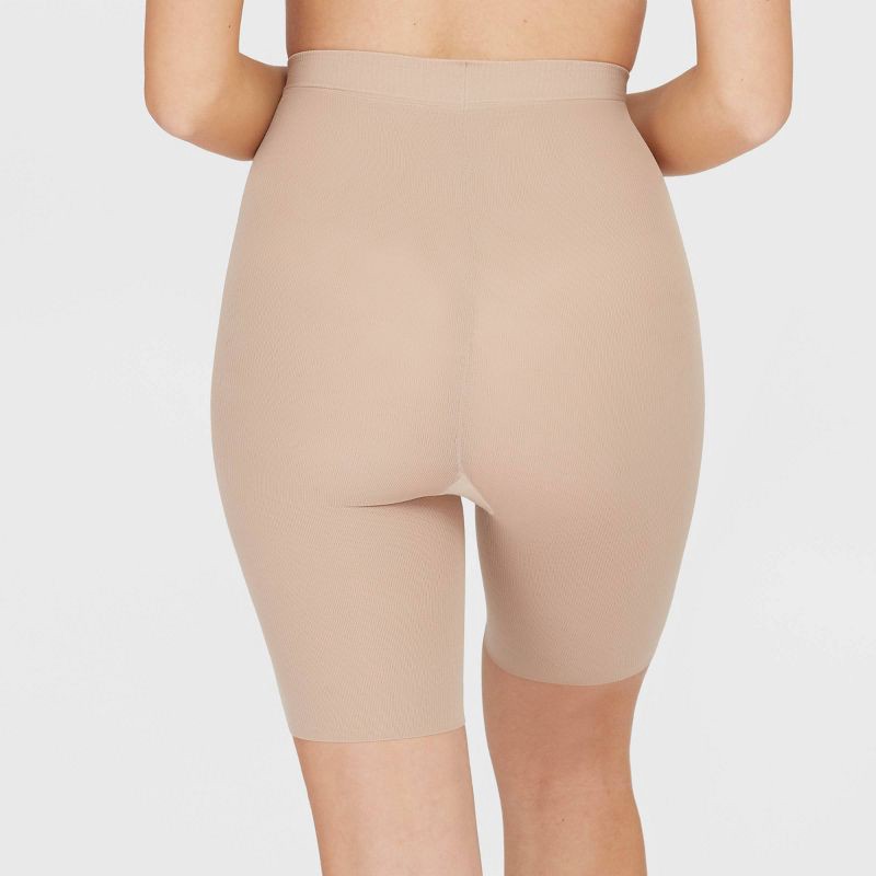 slide 3 of 5, ASSETS by SPANX Women's Mid-Thigh Shaper - Tan 2: Medium Control, Tummy & Hip Slimming, Nylon & Spandex, Hand Wash, 1 ct