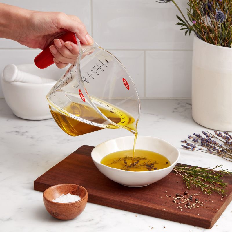 slide 5 of 7, OXO 2 Cup Angled Measuring Cup: Clear Plastic, Dishwasher-Safe, Lifetime Warranty, 7" Width, 4.1" Height, 1 ct