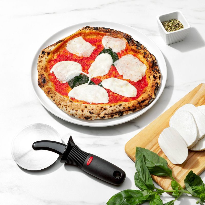 slide 5 of 5, OXO Softworks Pizza Wheel: Stainless Steel Pizza Slicer & Roller, Dishwasher-Safe, Black Handle, 1 ct