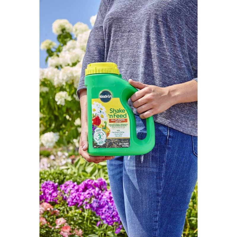 slide 3 of 7, Miracle-Gro Shake 'N Feed All Purpose Continuous Release Plant Food 4.5lb: Nutrient-Rich, Easy Dispensing, 3-Month Supply, 4.5 lb