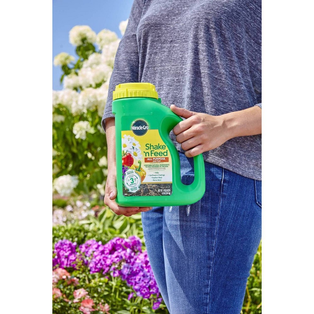 slide 3 of 7, Miracle-Gro Shake 'N Feed All Purpose Continuous Release Plant Food 4.5lb, 4.5 lb