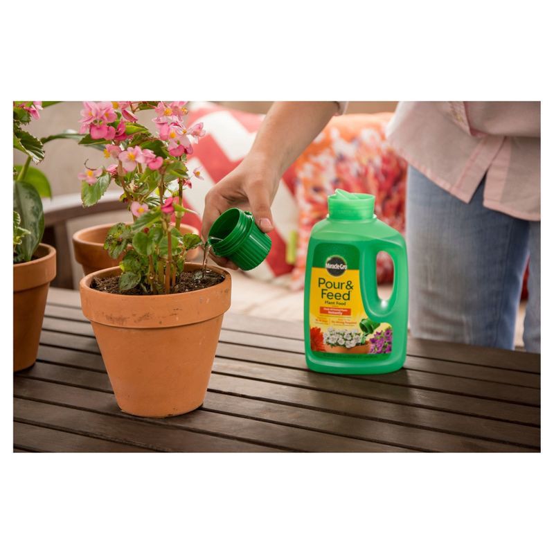 slide 3 of 4, Miracle-Gro Pour & Feed Liquid Plant Food 32oz Ready to Use: Indoor & Outdoor Container Fertilizer, 32 oz