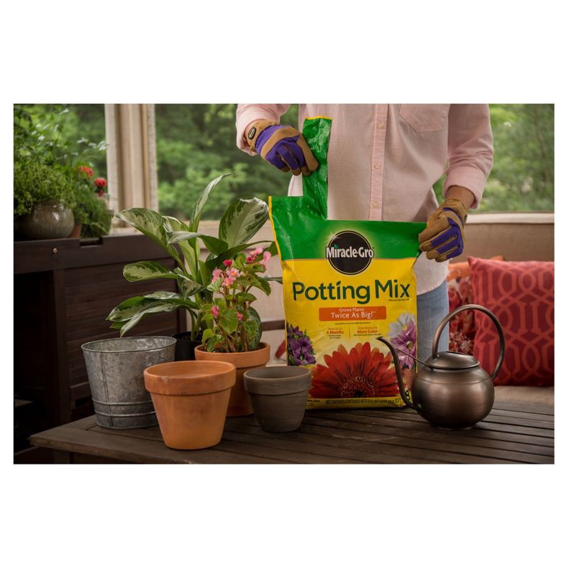 slide 2 of 4, Miracle-Gro Premium Potting Mix 1 Cubic Foot: Ideal for Patio, Lawn & Garden, Enhances Plant Growth, 1 ct