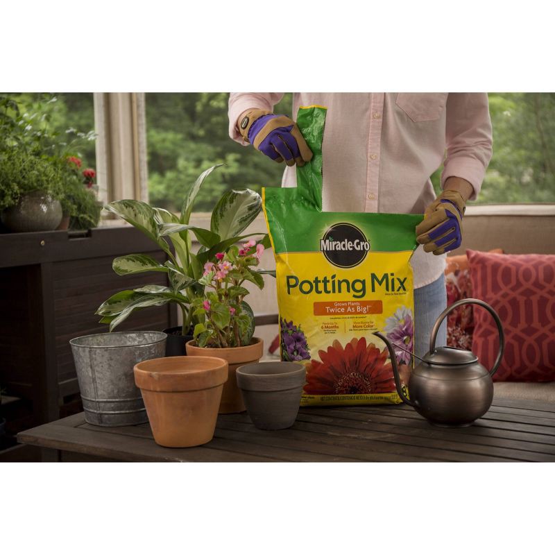 slide 4 of 9, Miracle-Gro Premium Potting Mix 8qt: Ideal for House Plants & Flowers, Lawn & Garden Enrichment, 8 qt