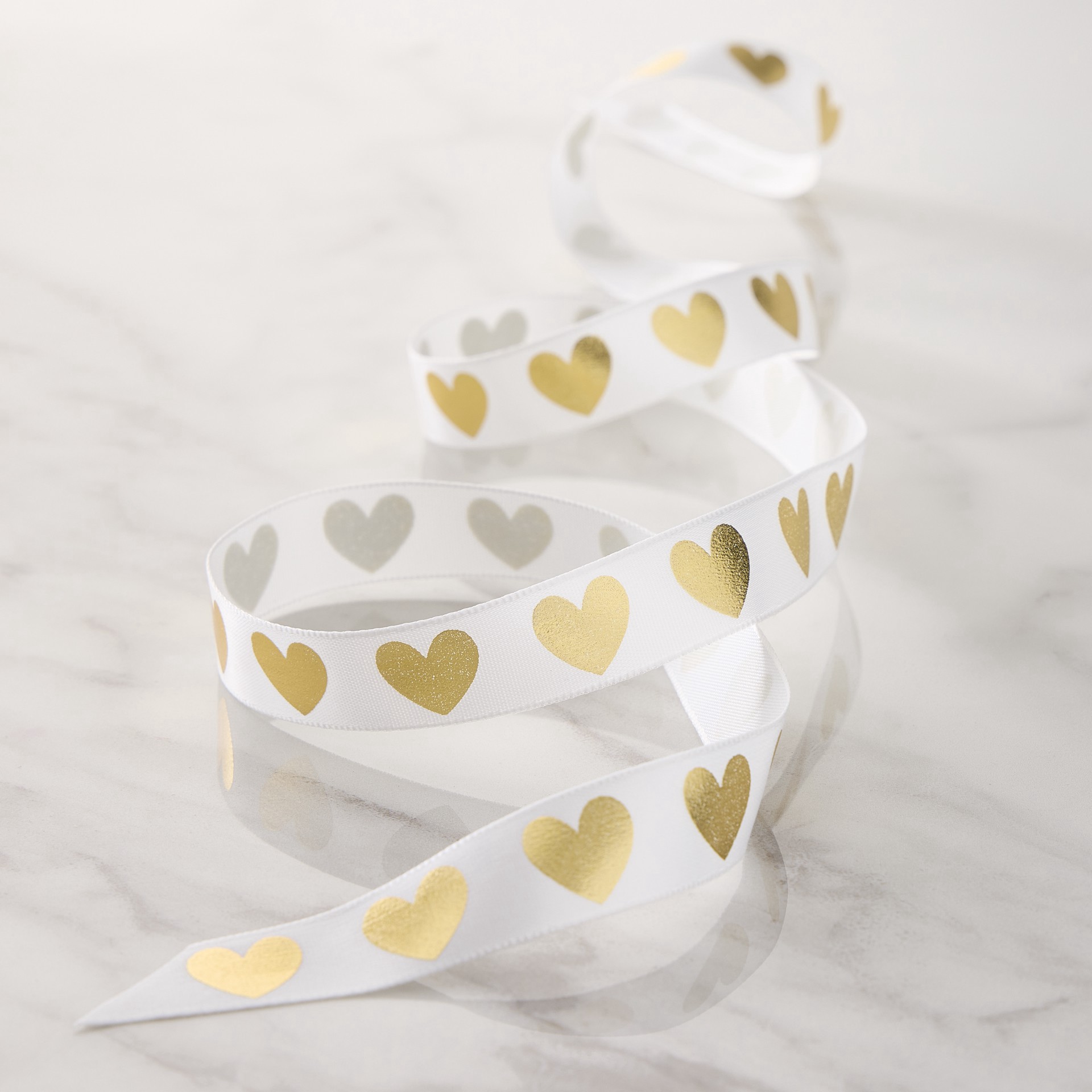 slide 2 of 2, 5/8" X 7yd. White & Gold Foil Hearts Satin Ribbon By Celebrate It Classic, 5/8 in x 7 yd