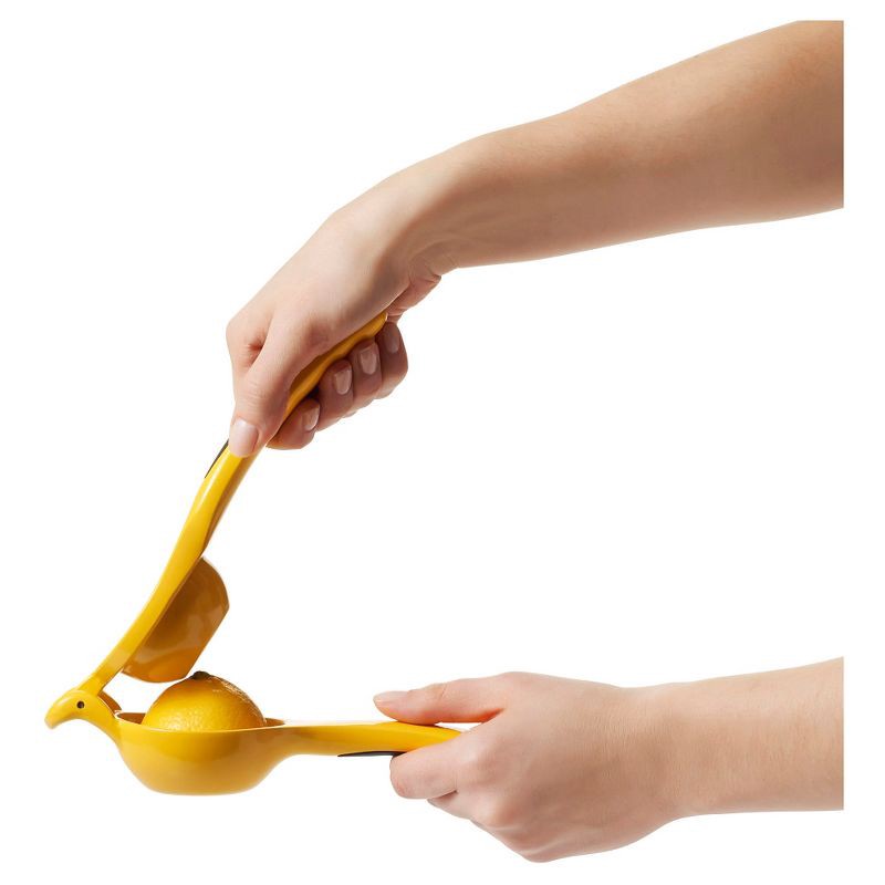 slide 4 of 7, OXO Softworks Citrus Squeezer: Aluminum Handheld Lemon & Lime Juicer, Dishwasher-Safe, Yellow, 1 ct