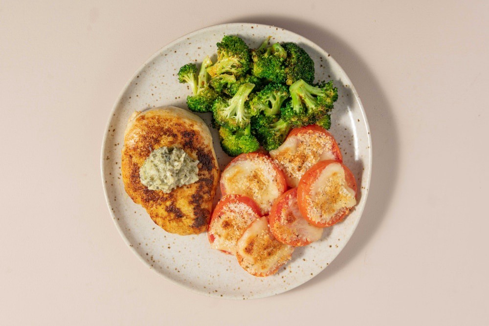 slide 1 of 2, Home Chef Meal Kit Chicken And Scampi Butter With Fontina Gratin Tomatoes And Broccoli, 33 oz