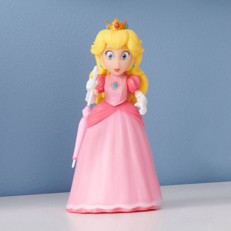 slide 2 of 5, Nintendo The Super Mario Bros. Movie Peach Figure with Umbrella Accessory, 1 ct