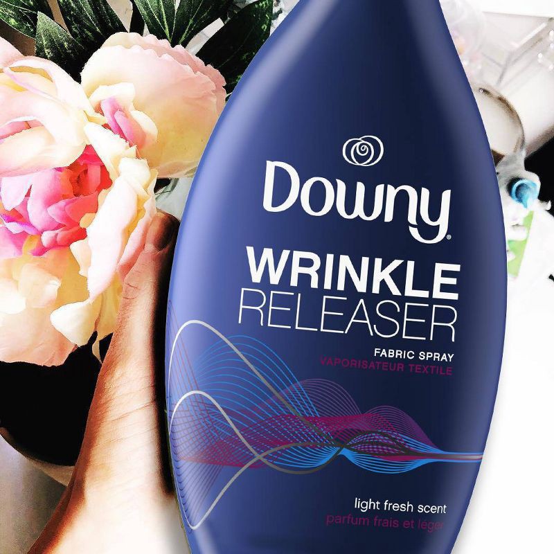 slide 6 of 8, Downy Wrinkle Releaser Light Fresh Scent Fabric Refresher Spray - 33.8 fl oz, 33.8 fl oz