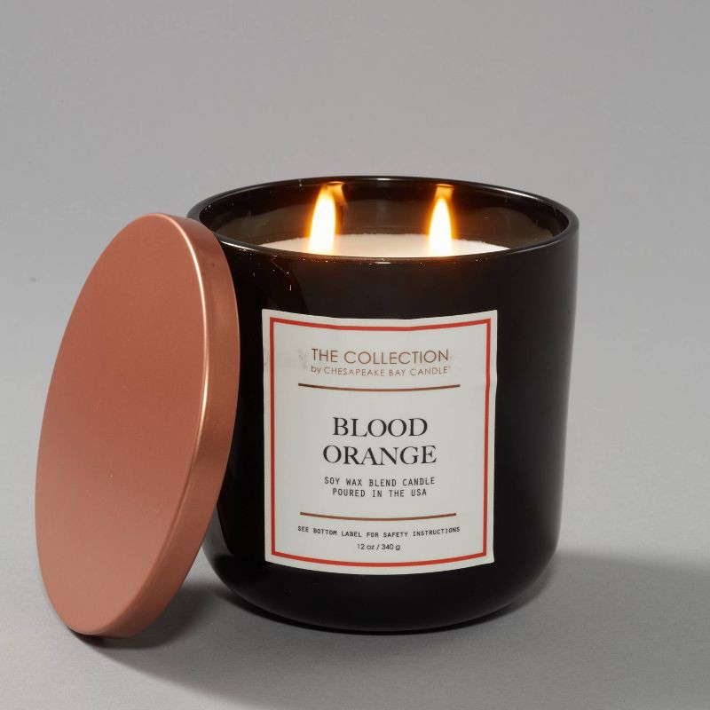 slide 3 of 5, 2-Wick Black Glass Blood Orange Lidded Jar Candle 12oz - The Collection by Chesapeake Bay Candle: Citrus & Honeyed Mango Aroma, 12 oz