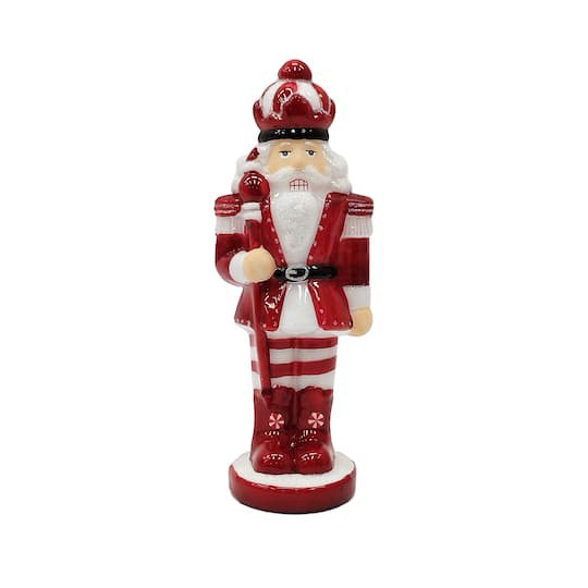 slide 1 of 3, 10" Red & White Glass Peppermint Nutcracker With Staff By Ashland, 75 in x 3 in x 10 in