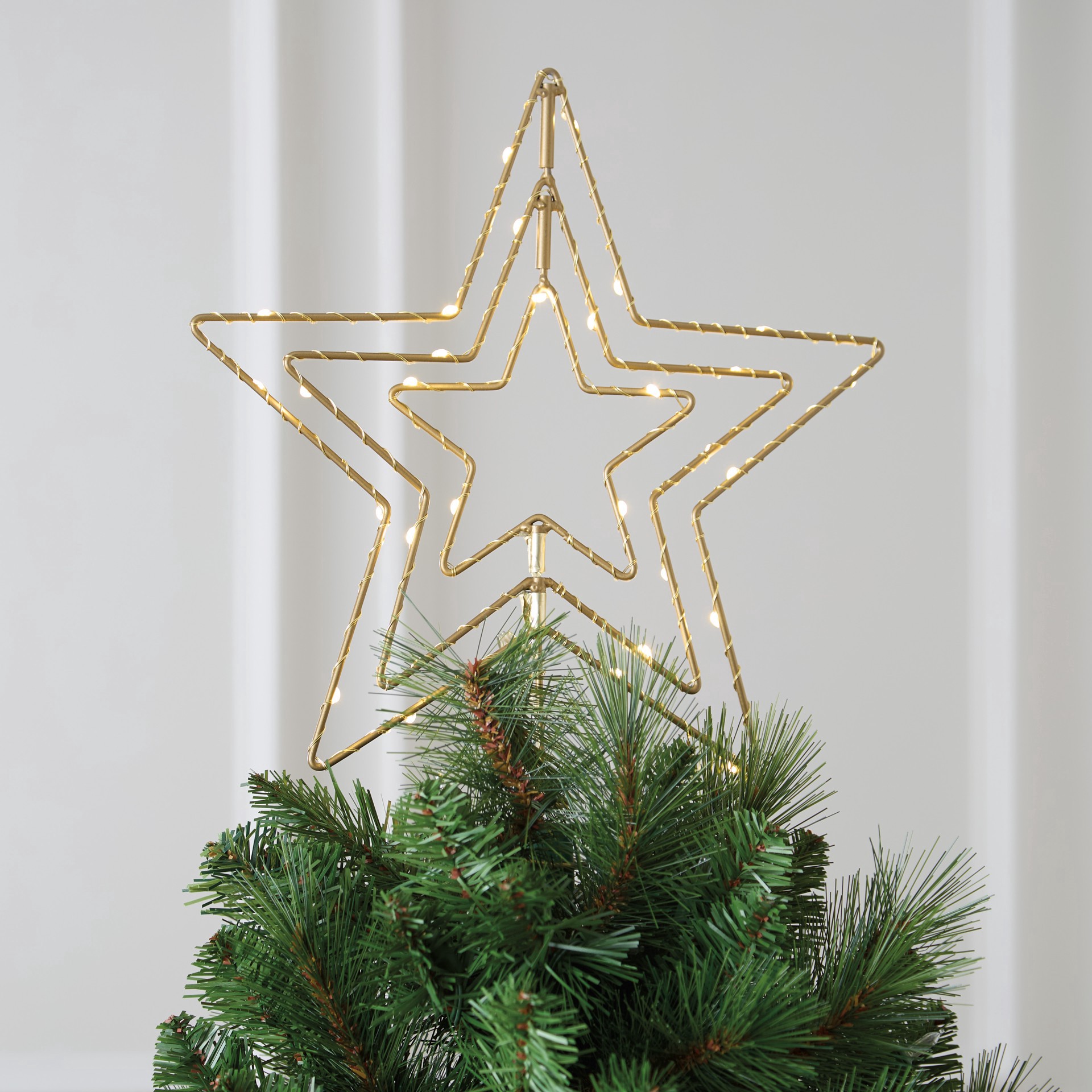 slide 2 of 4, 12" Gold Metal Star Lighted Tree Topper By Ashland, 12 in
