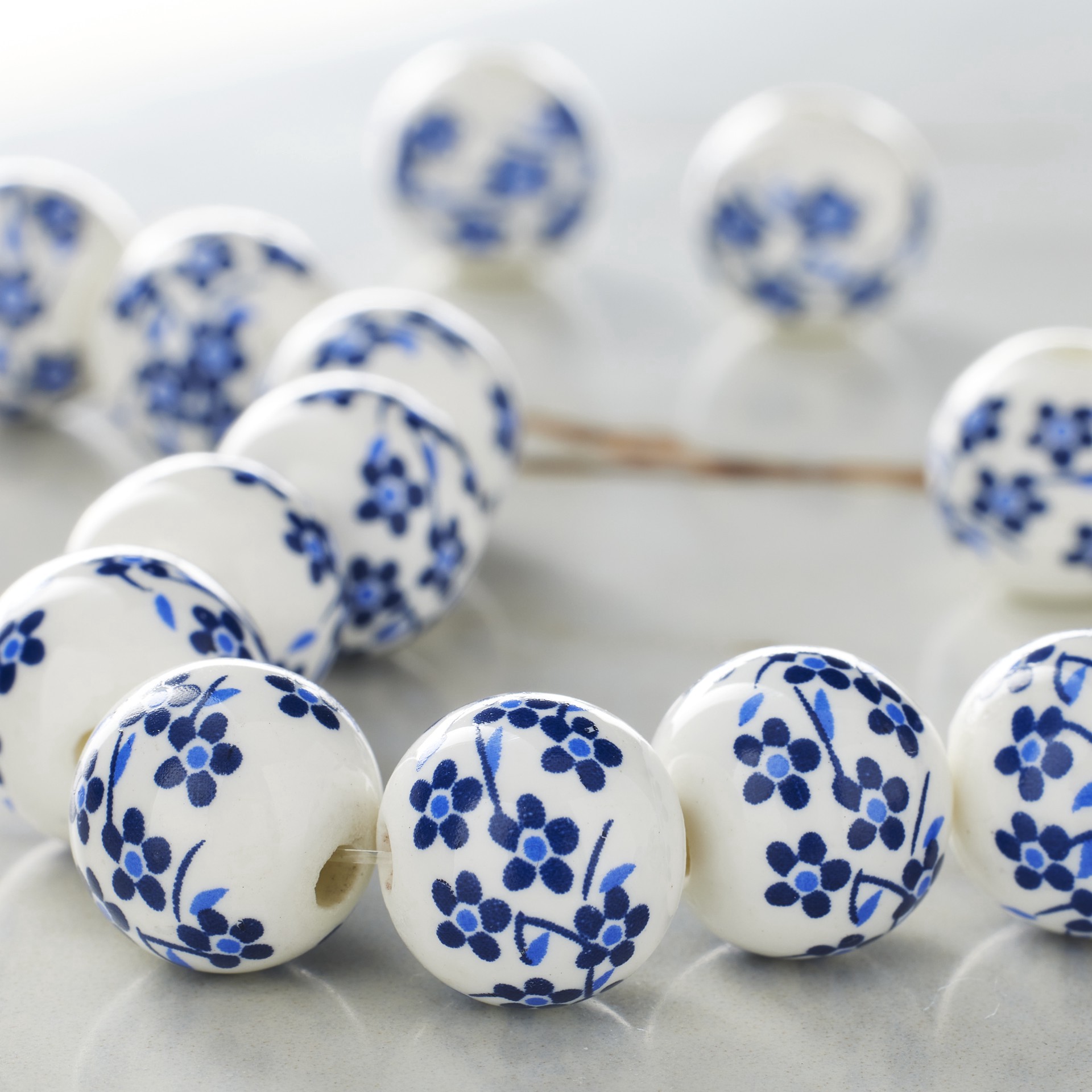 slide 3 of 3, White & Sapphire Ceramic Round Beads, 12mm By Bead Landing, 12mm